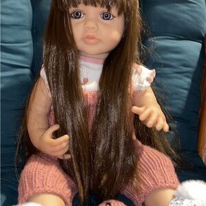 Adorable Brown-Haired Doll with Pink Outfit